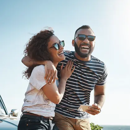 Happy couple with phone